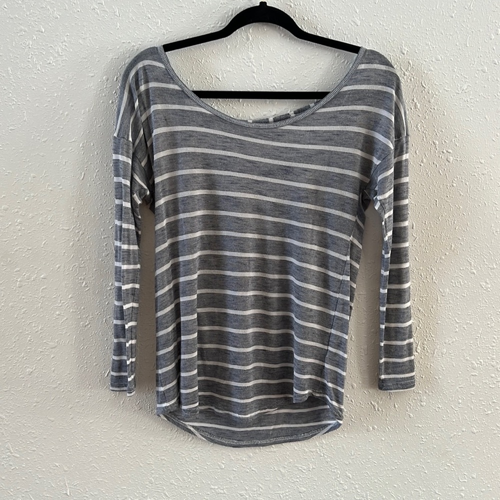Light grey/blue and white striped shirt. size small